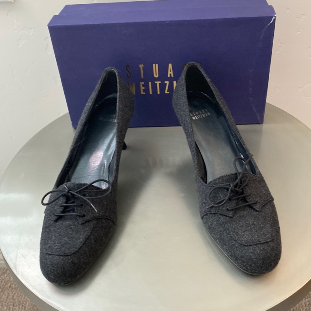 Stuart Weitzman Gray flannel women’s 2” pumps.